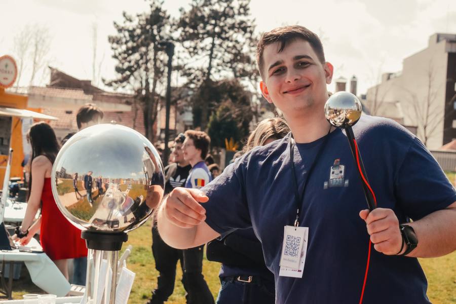 Volunteer showing a plasma ball experiment
