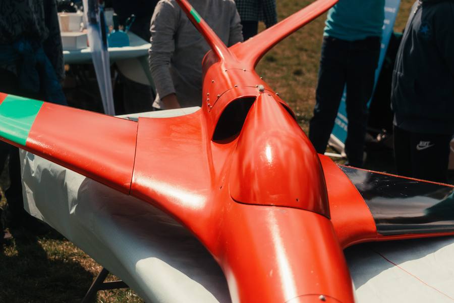 Close-up of a red aircraft model on display