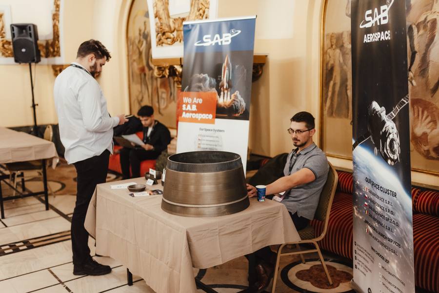 The SAB Aerospace stand, with a large machined part on display